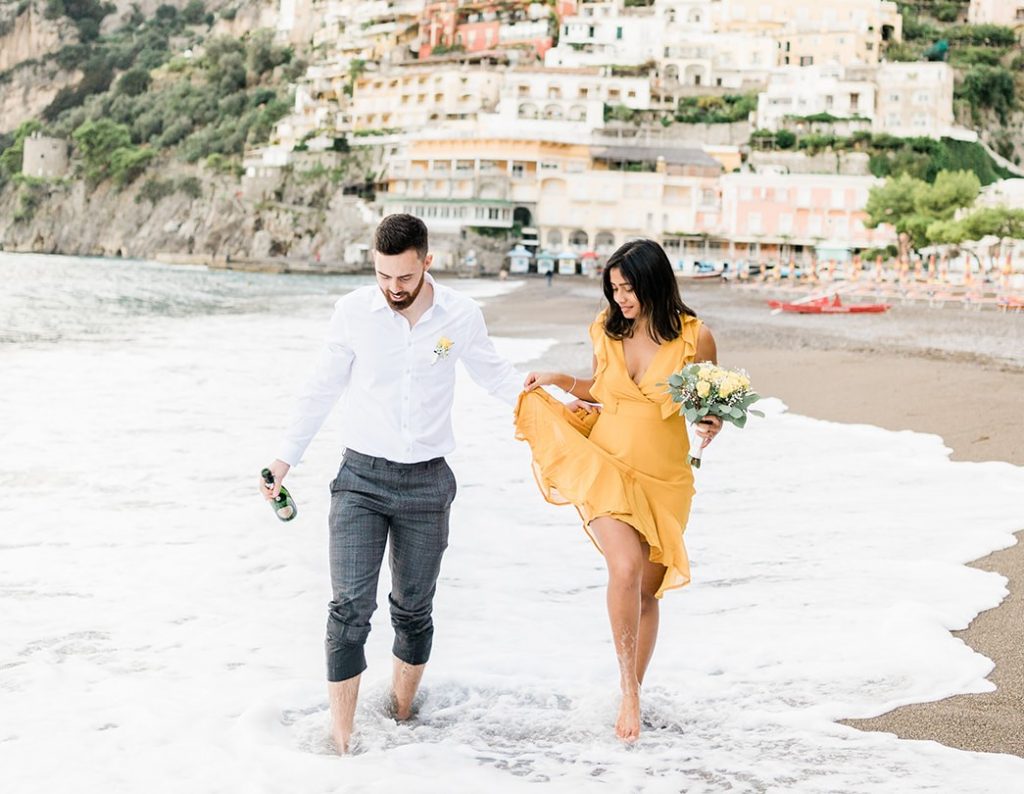 bride walking on the beach